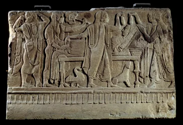 Etruscan antiquity: Plaque of funerary cippe. Exhibition of the deceased on her funeral bed. Paris, Musee Du Louvre