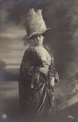 Attractive young woman, wearing a strange hat