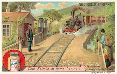 Bells to warn of approaching trains at a railway crossing
