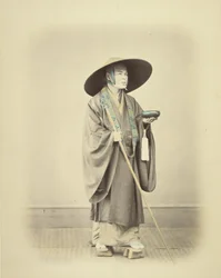 Priest with Walking Stick