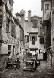A Courtyard Surrounded by Buildings in Venice, c.1880
