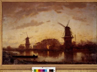 The banks of the Amstel River landscape with mills in the Netherlands
