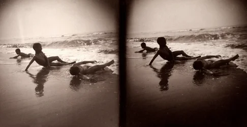 Three children on the shoreline, Abruzzo, c.1890-1900