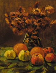 Apples, oranges and a vase of flowers on a table