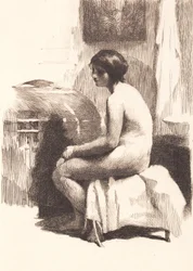 Nude Female Model Sitting in a Room