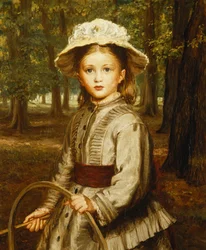 A Young Girl Playing with a Hoop
