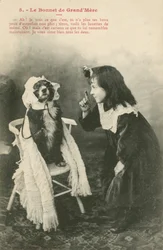 Child Dressing Her Dog in a Bonnet