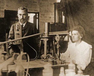 Pierre and Marie Curie in the laboratory