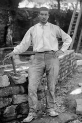 Young man employed in the restoration of the Abbey of Septfontaines, near Bourmont in Haute-Marne, around 1880. Photography. Ducos Collection