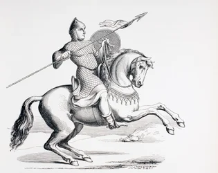 A Norman Knight dressed in Chain Mail and Helmet carrying Spear and Shield