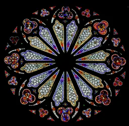 A late 13th century rose window with some original glass