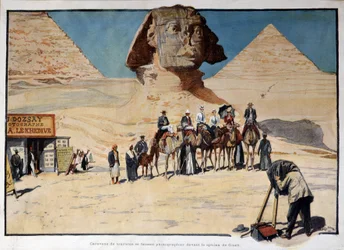 Caravan of tourists being photographed in front of the Gizeh sphinx