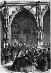 Palm Sunday: distribution of the branches at the door of the church Saint Germain l