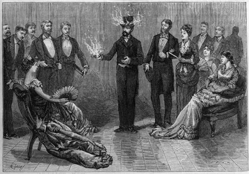 Experience of Combustible Liquid, Burning on a Hat, on a Handkerchief, etc., Without Producing a Fire, Executed at the Conservatoire des Arts et Metiers in 1881. Engraving in 