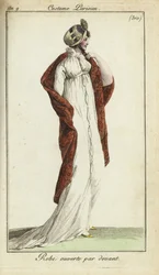 Fashionable woman in straw hat, dress and shawl