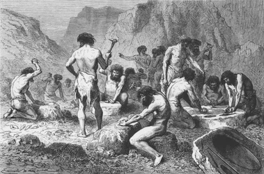 Making and polishing silex at Pressigny, illustration from L