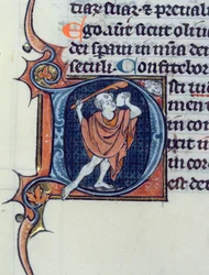 A fool holding a stone and a rod