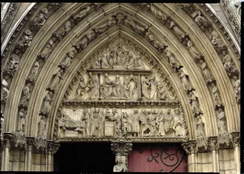 North transept portal, detail of tympanum depicting scenes from The Infancy of Christ and the Story of Theophilus