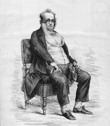 Portrait of Henry Monnier (1799-1877), French playwright, cartoonist and comedian. He is dressed as Monsieur Prudhomme, a character invented by Monnier, a cartoon of the French bourgeois in the 19th century. Engraving in Le Monde Illustré n°1031