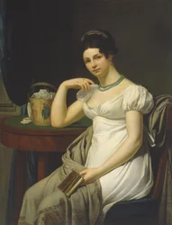 Portrait of a woman in an interior with a work basket