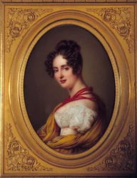 Portrait of a young woman with a red necklace