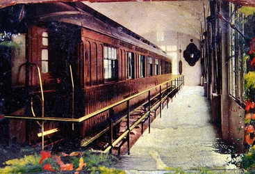 Postcard depicting the railway carriage where the Signing of the Armistice took place at Rethondes in the Forest of Compiegne on 11th November 1918
