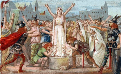 Sainte Genevieve, organized the defense of Paris against the Huns hordes of Attila and reassured the people of Paris in 451. Chromolithography of the late 19th century.