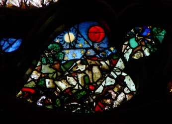 The west rose window depicting a scene from the Book of Revelation: Opening the sixth seal: The great day of his wrath; the ruin created by earthquakes, the sun with a black sackcloth of hair