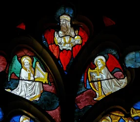 Window depicting musical angels and God