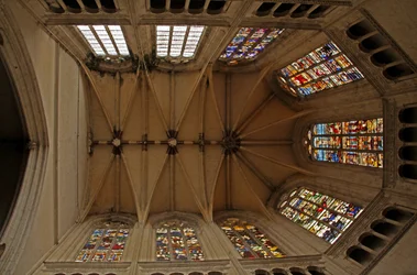 Window view of choir depicting the choir vaults and clerestory windows of the choir