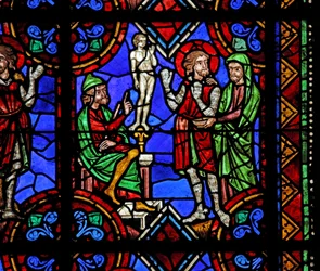 Window depicting St Julian of Brioude story - St Ferreol, a friend of Julien, who died during the Diocletian persecutions, forced to worship idols