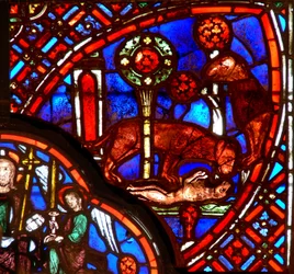 Window depicting a lion and cubs