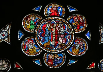 Window w11 depicting a Holy Woman brings the news of the Resurrection to St Peter