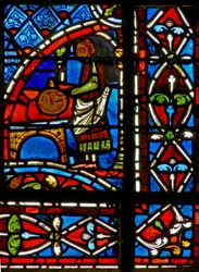 Window w11 depicting a draper donor and border panels