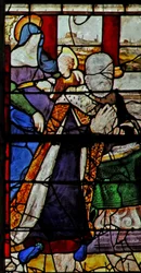 Window depicting Anne de Montmorency with St Anne teaching the Virgin to read