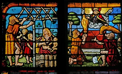 Window depicting Adam building a house and Eve bringing up their children; Cain and Abel making their offerings to the Lord