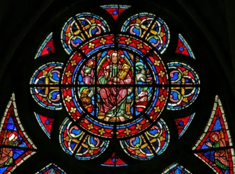 A rosette: Christ surrounded by Evangelist symbols
