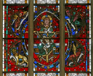 Window depicting the Trinity surrounded by the emblems of the Evangelists