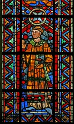 Window depicting a Cleric