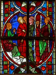 Window depicting St Nicholas enticed by women