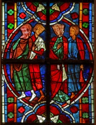 Window depicting a group of 3 men and a woman