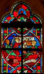 Window depicting a scene from a legend of St Nicholas: a devil gives travellers a liquid but the flask is lost overboard