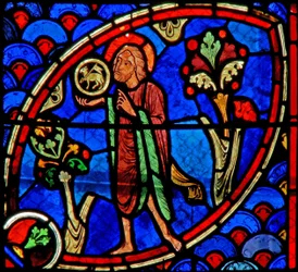 Window w20 depicting St John the Baptist: Ecce Agnus Dei