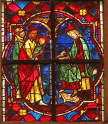 Window depicting St John the Baptist is enrolled