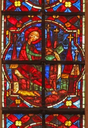 Window depicting St John writes the Book of the Apocalypse