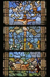 Window depicting Christ on the Cross surrounded by Virgil-inspired country scenes