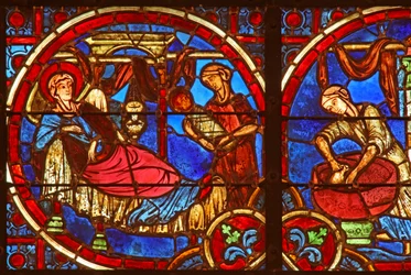 Window depicting the Nativity with midwives