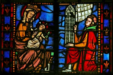 Window 37 depicting the Virgin and Child and donor offering a window