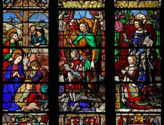 Window depicting the Nativity with Shepherds; donors and patron saints
