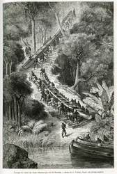 Tragging canoes at Innkissi Falls (or Livingstone Falls) (Congo), under the direction of Sir H.M.Stanley (1841-1904), drawing by G.Vuillier, to illustrate the story Through the Mysterious Continent, a voyage made between 1874-1877, by Sir H.M.Stanley. Engr